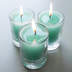 blue wax filled glass votives