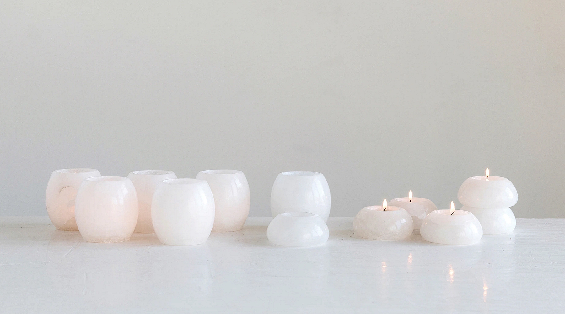 white alabaster candle holders