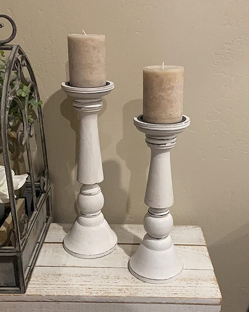 white wooden candle holders