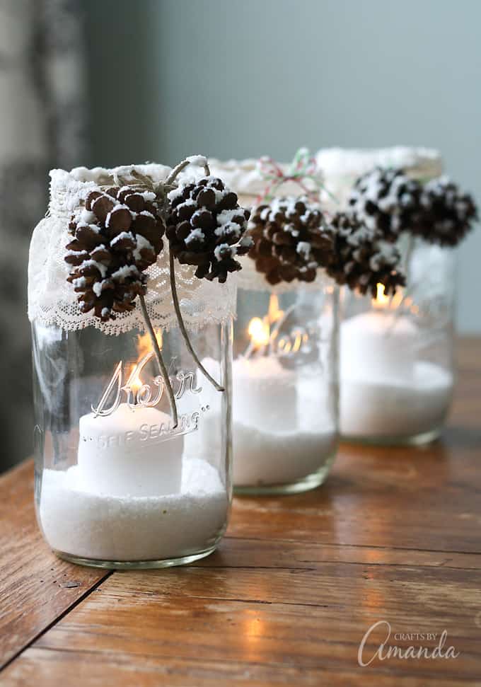 snowy pinecone candle jars