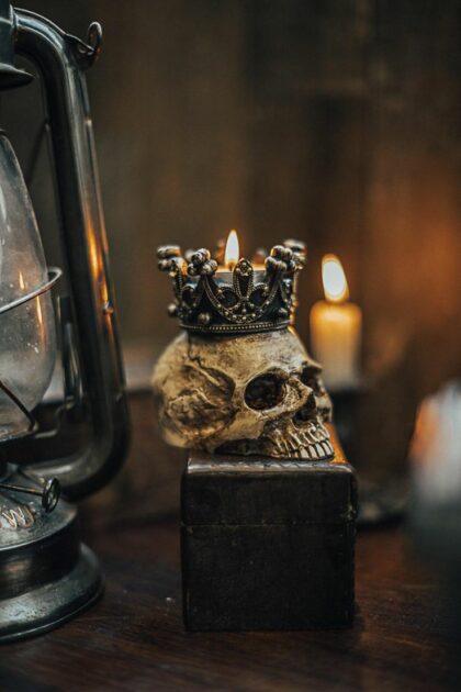 antique skull candle holder
