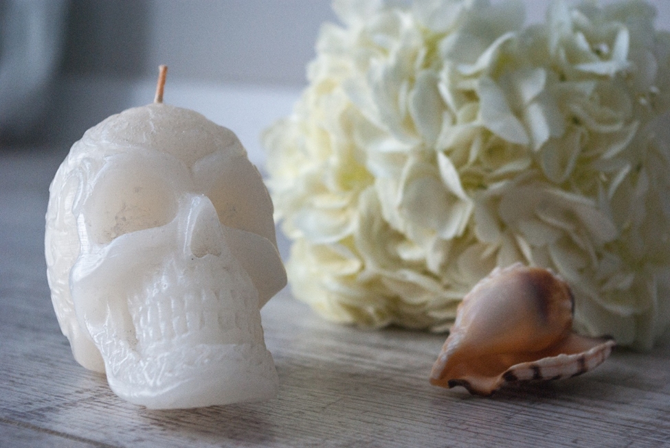 white skull candle holder