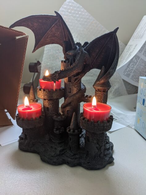 black dragon castle red 3 telight candle closeup angle view medieval candle holder