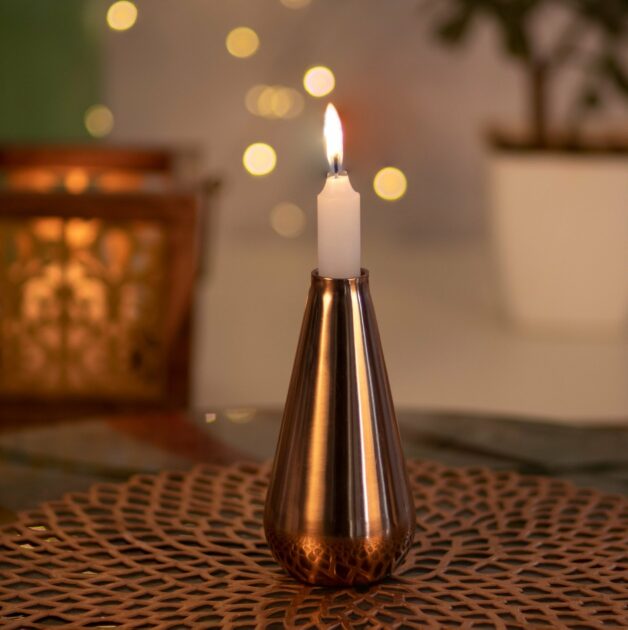 copper round base and narrow top candle holder