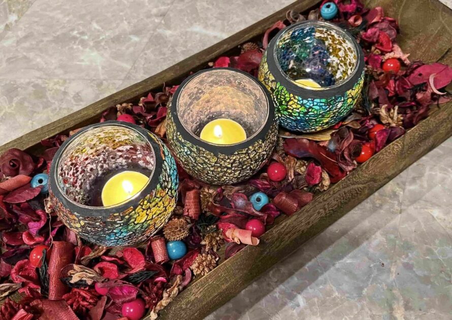 mosaic candle holders on wood tray with scented petals