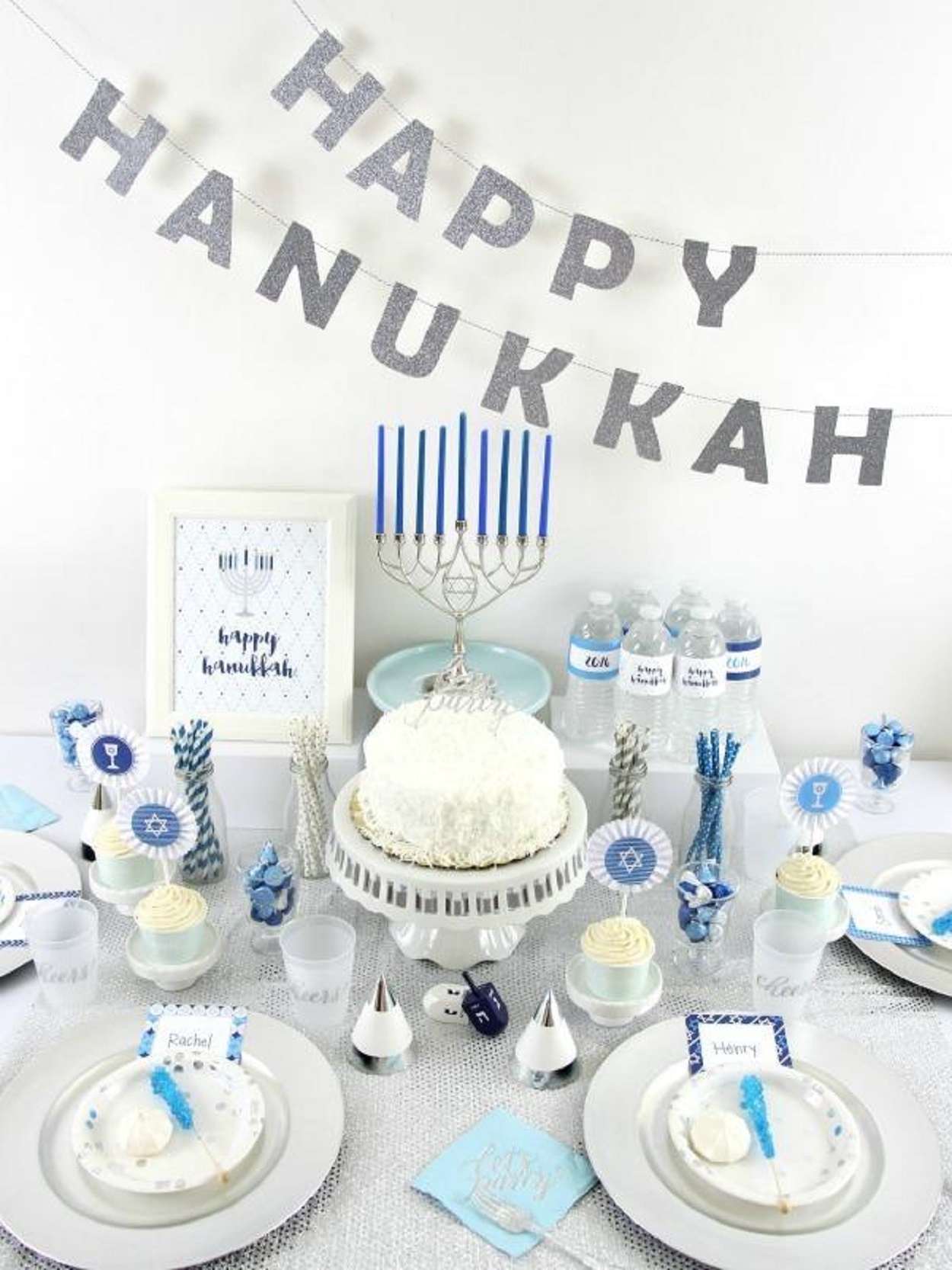 silver happy hanukah banner bright white top angle view menorah candle holders