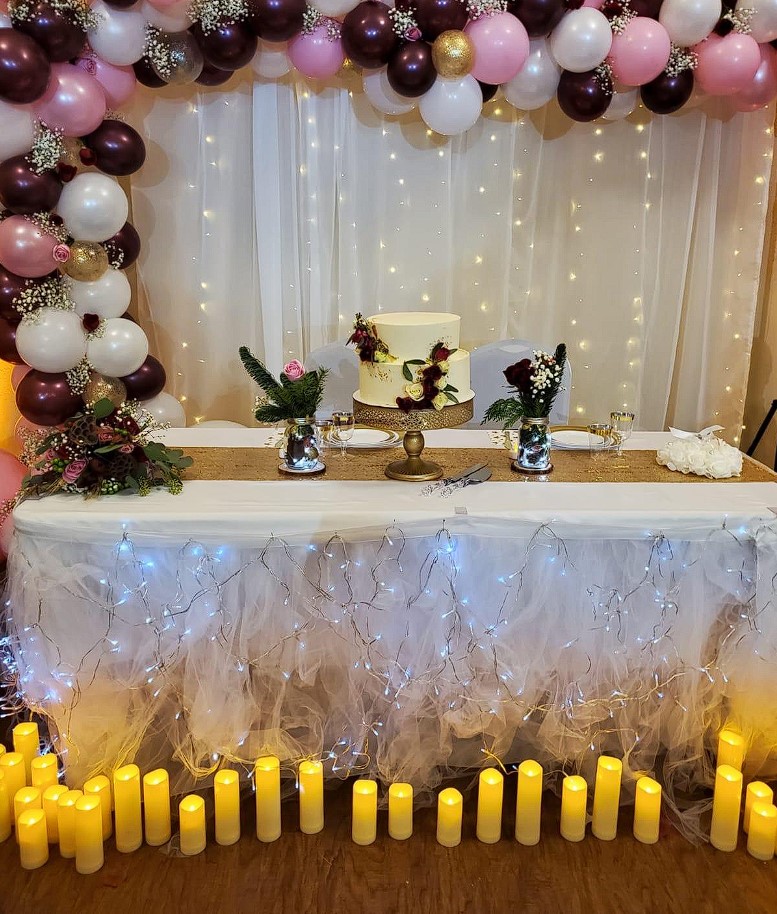 flameless candles on floor cake and dessert table decoration