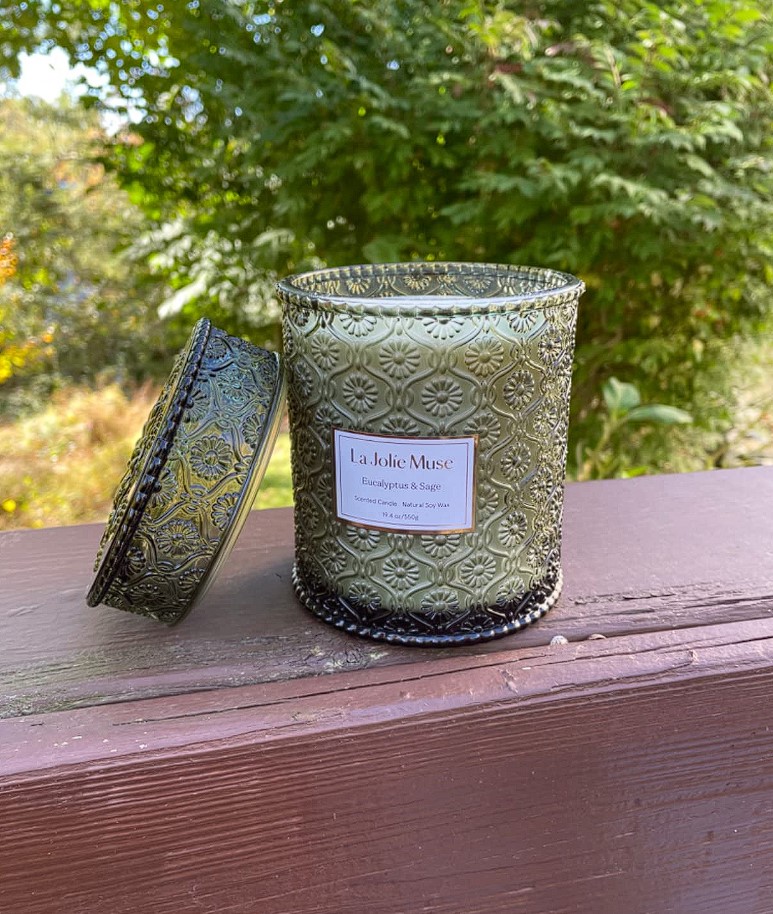 luxurious candle gift sets on textured vintage jar