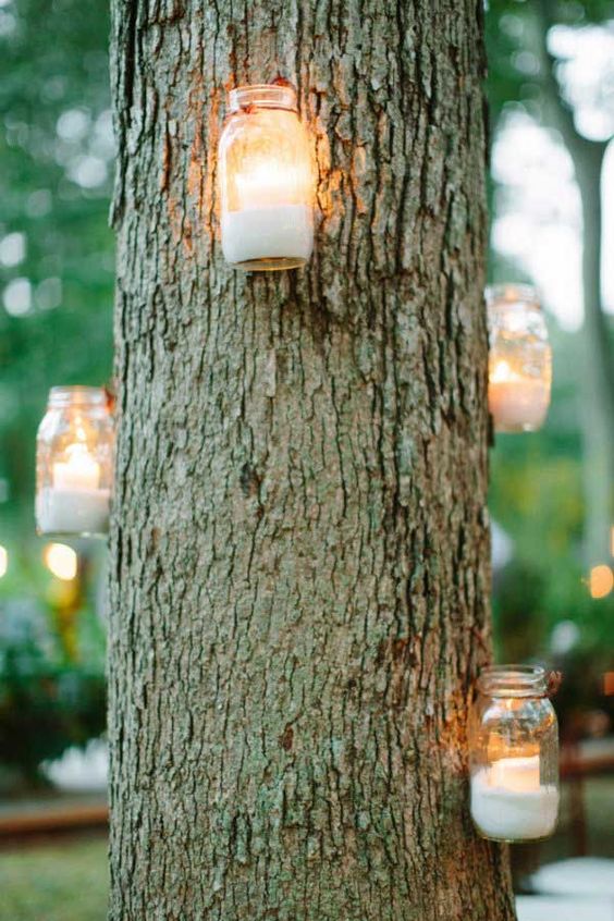 outdoor tree hanging candle holder rustic feel
