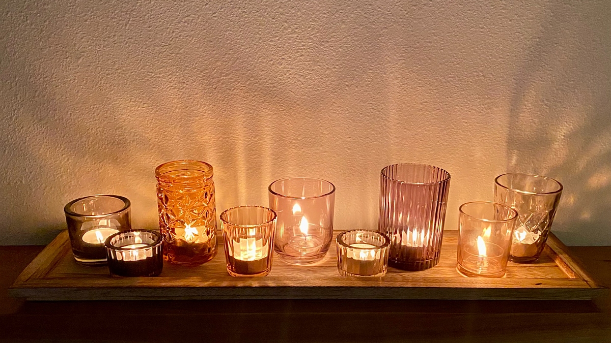 Why votive candles are used?